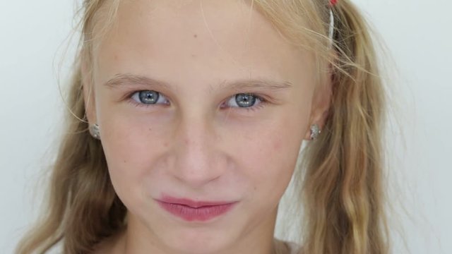 Beautiful young girl indoor, portrait children close up