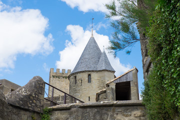 Fototapeta premium Europe, France,Languedoc-Roussillon, ancient fortified city of Carcassonne, UNESCO World Heritage Site. Chateau de Carcassonne. City walls and entrance/exit gates.