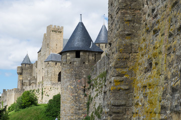 Europe, France,Languedoc-Roussillon, ancient fortified city of Carcassonne, UNESCO World Heritage Site. Chateau de Carcassonne. City walls and entrance/exit gates.