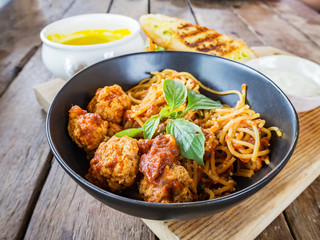 Spaghetti pasta with meatballs and tomato sauce