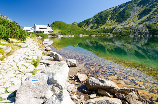 view on shelter in 5 polish lakes valley in Tatra mountains, Poland