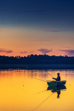 man fishes in the lakes of the Mazury