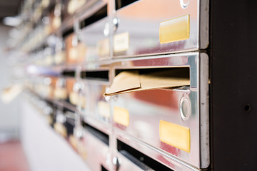 Metal postboxes with mails