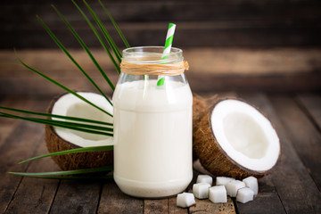 Obraz na płótnie Canvas Coconut milk in the jar