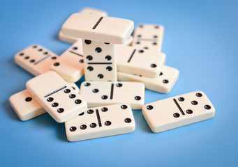 dominoes on a blue background