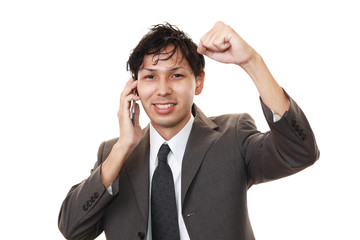 ガッツポーズのビジネスマン