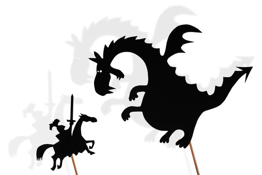 Shadow puppets of dragon and knight and their shades on white background