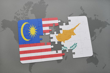 puzzle with the national flag of malaysia and cyprus on a world map background.