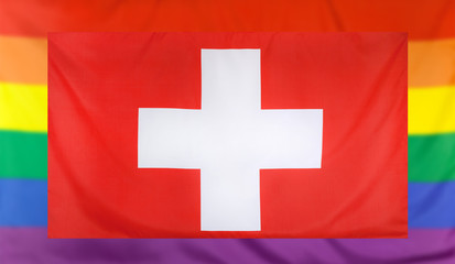 Obraz premium Flag of Switzerland and rainbow flag