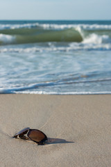 Fototapeta na wymiar Sunglasses stranded in Surf City