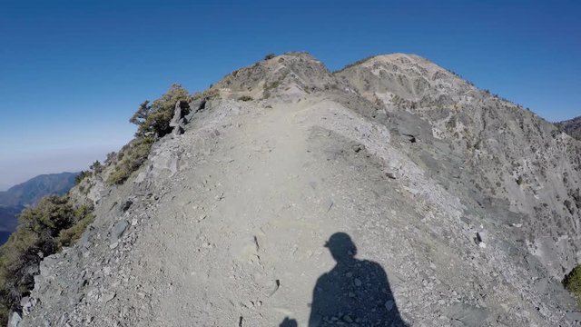 Moving time lapse following shadow up 10,069 foot Mt Baldy in the San Gabriel Mountains above Los Angeles, California.