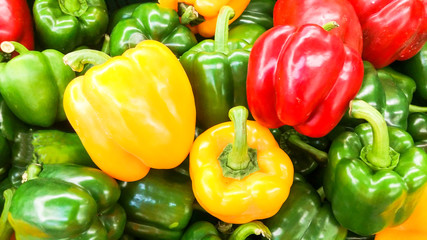 the colorful of sweet bell pepper on shelf for sell in supermarket