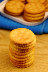Fototapeta na wymiar stack of biscuit cookies on wood background.
