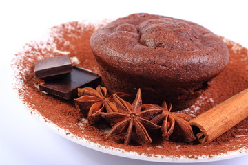 Baked muffins, star anise, cinnamon and chocolate