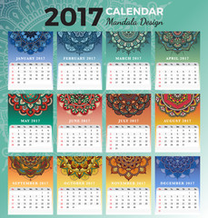 Printable monthly calendar 2017 design with colors of seasons and henna tattoo. 2017 Desk calendar template start with Sunday and support for 8.5x11 inches. Vector illustration