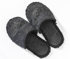 Two black slippers.