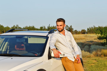 The man and his car in the steppe.