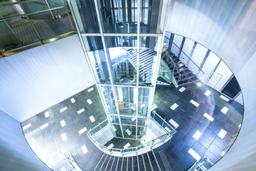 glass sighseeing lift with spinning staircase