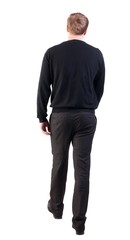 back view of walking  business man. going young guy in red shirt.  Isolated over white background. Rear view people collection.  backside view of person.  office worker in warm clothing goes ahead