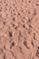 Sand pattern and human traces on Baltic sea coast