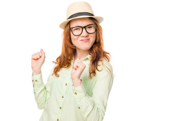 girl with red hair is successful in everything portrait on a whi