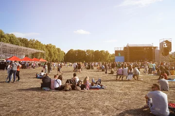  People at open air concert on sunny day © Africa Studio