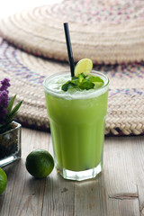Obraz na płótnie Canvas ambarella juice, popular fresh drink in south east asia served w