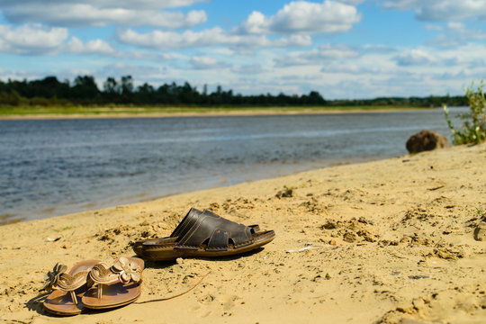 Flip flops on a sandy beach