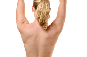 Fototapeta premium Back of a fit young woman with raised arms