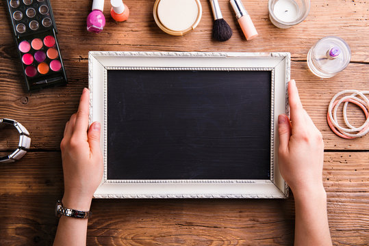 Unrecognizable Woman Holding Empty Picture Frame, Various Make-u