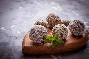 Raw vegan candies c with dried fruit and coconut