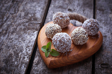 Raw vegan candies c with dried fruit and coconut