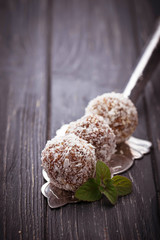 Raw vegan candies c with dried fruit and coconut