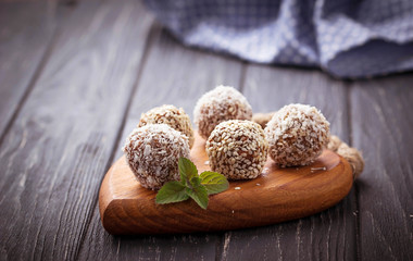 Raw vegan candies c with dried fruit and coconut