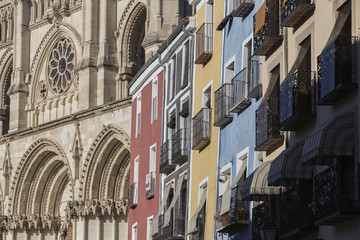 Detail of the colourful buildings and Cathedral on Plaza Mayor, Cuenca, Spain