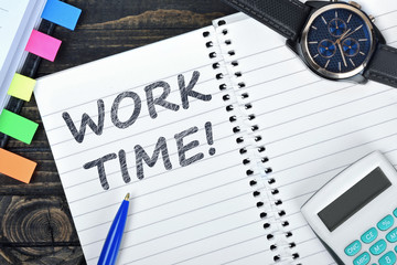 Work time text on notepad and watch