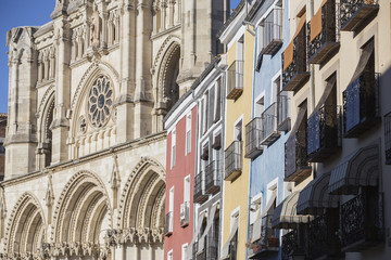 Detail of the colourful buildings and Cathedral on Plaza Mayor, Cuenca, Spain