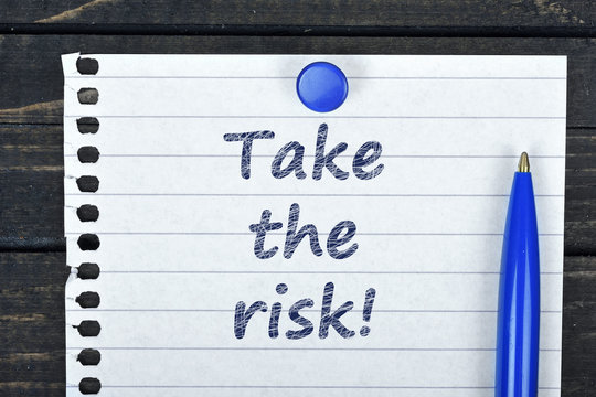 Take The Risk Text On Page And Pen