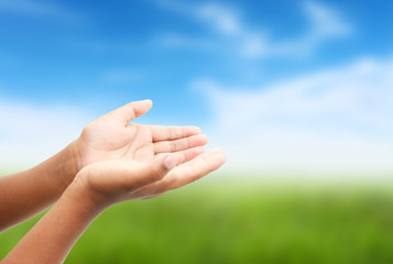 Hand of child praying