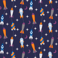 Fototapeta na wymiar Seamless pattern with vintage rockets in space