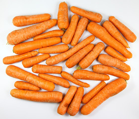 Pile of Fresh carrots on a white background