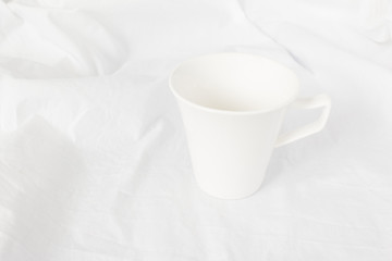 Fototapeta na wymiar Blank white cup