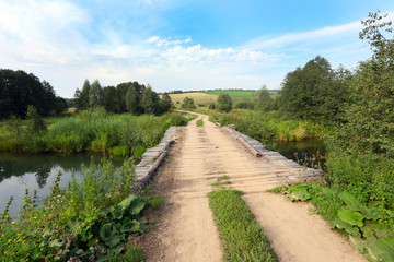 wooden bridge on the river