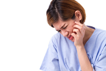 woman suffering from toothache, tooth decay or sensitivity