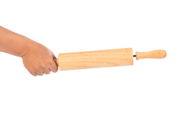 hand hold rolling pin on white background ,selective focus