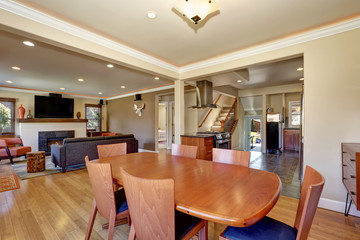 Craftsman kitchen and dining combo with soft beige walls