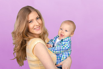 Happy young mother and her son