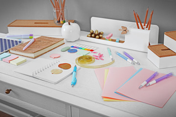Office and school set with stationery and notebooks on a table