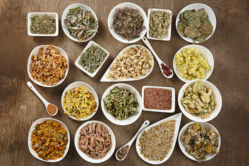 Natural flower and herb selection in ceramic bowls, close up