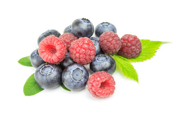 Ripe raspberry with blueberry isolated on white